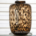 tall deep amber colored leopard spot glass vase